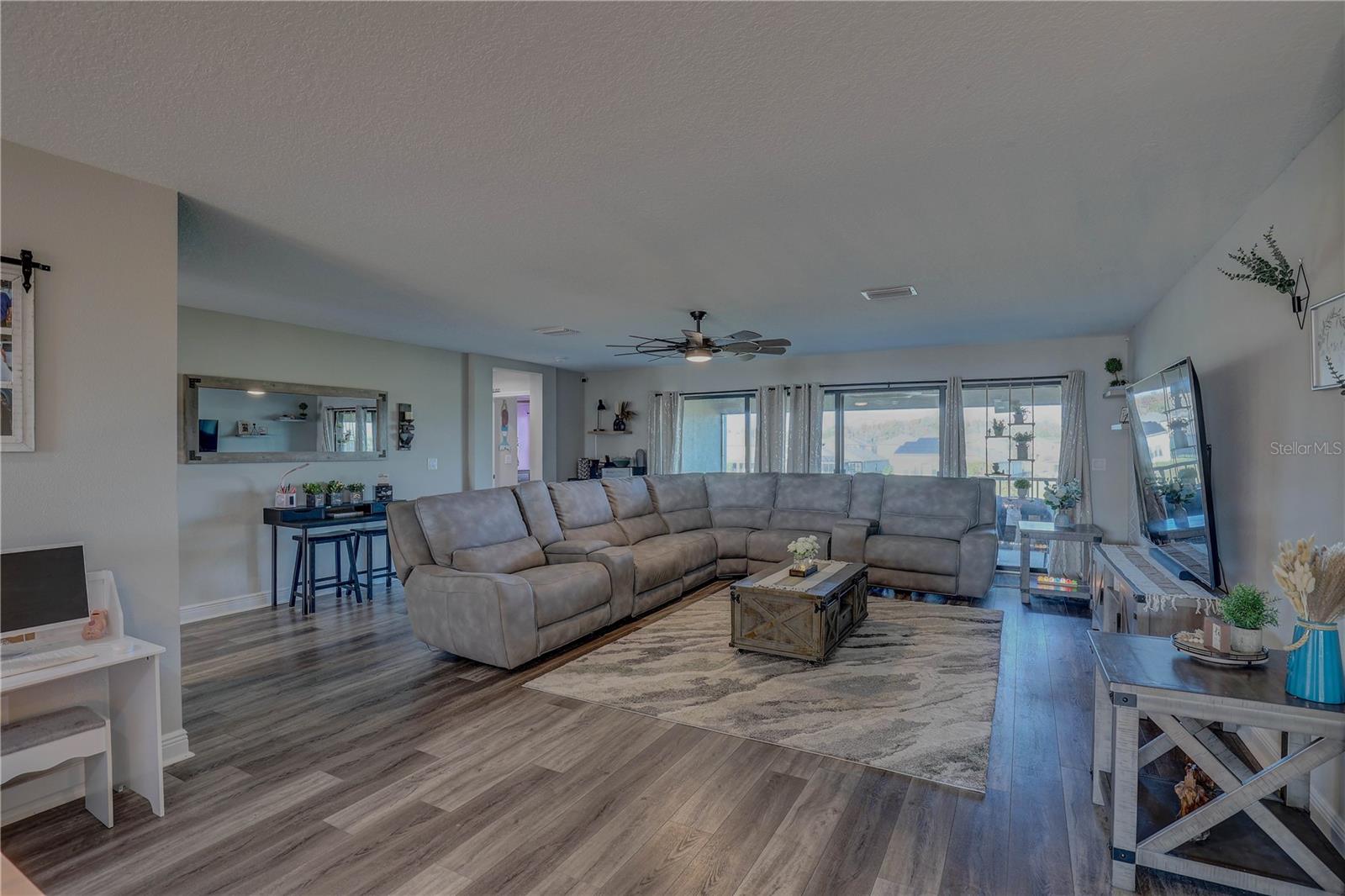 huge loft area where the whole family can gather, leads to 2nd story screened lanai.