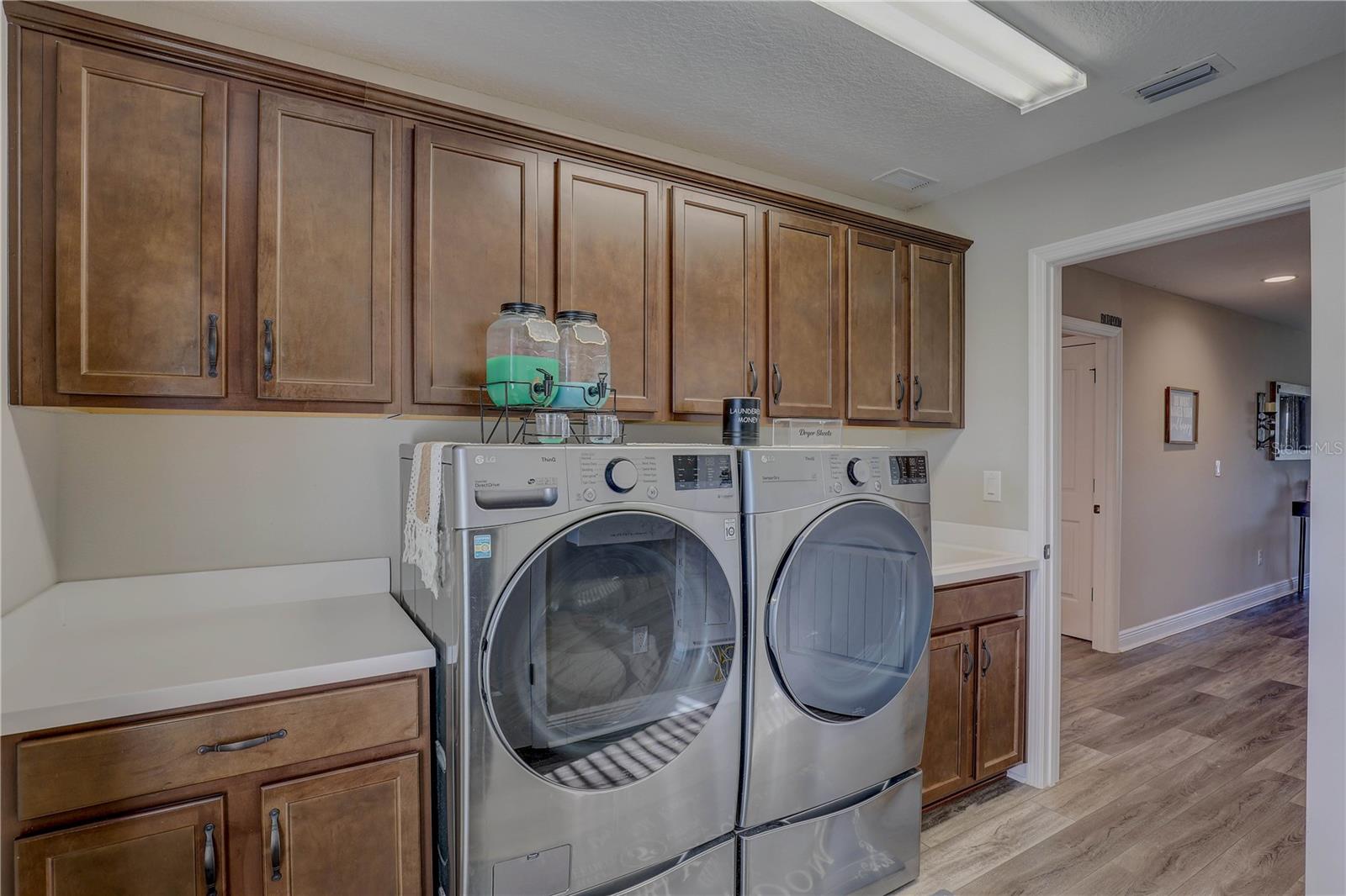Upstairs laundry room with tons of storage.