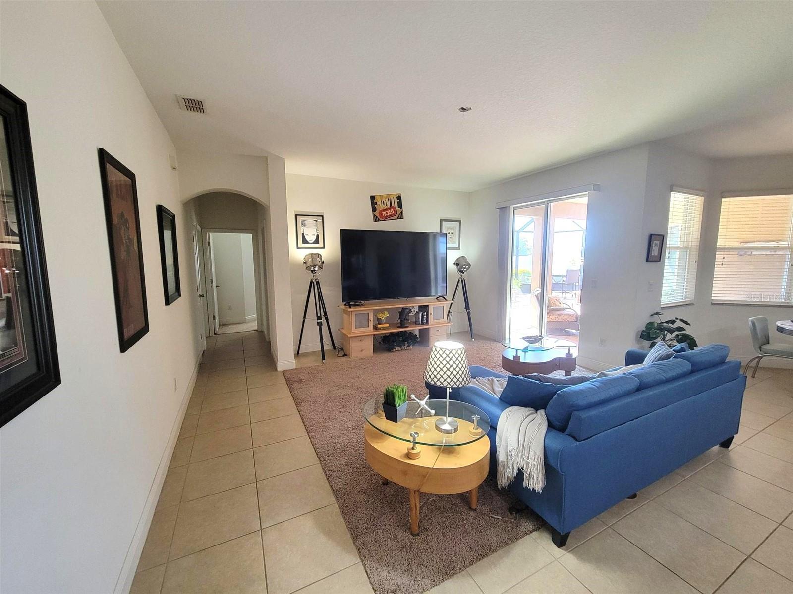 Family room with convenient access to the bedroom wing and pool bath.