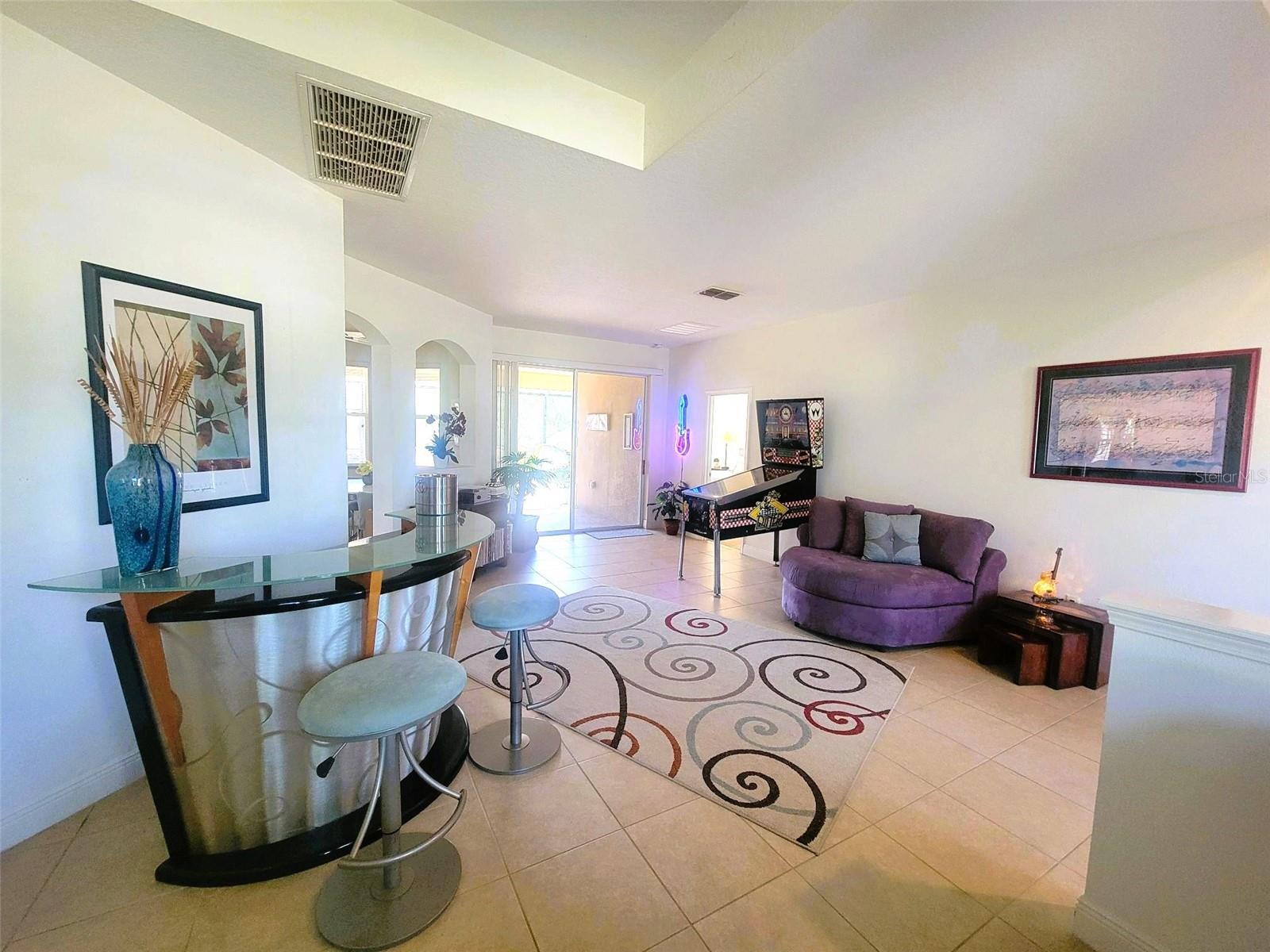 Light-filled living and dining room combo with flexible seating options.