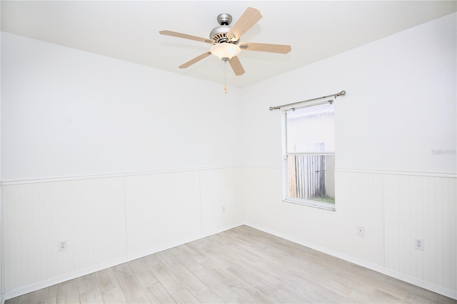 3rd bedroom with chair rail installed