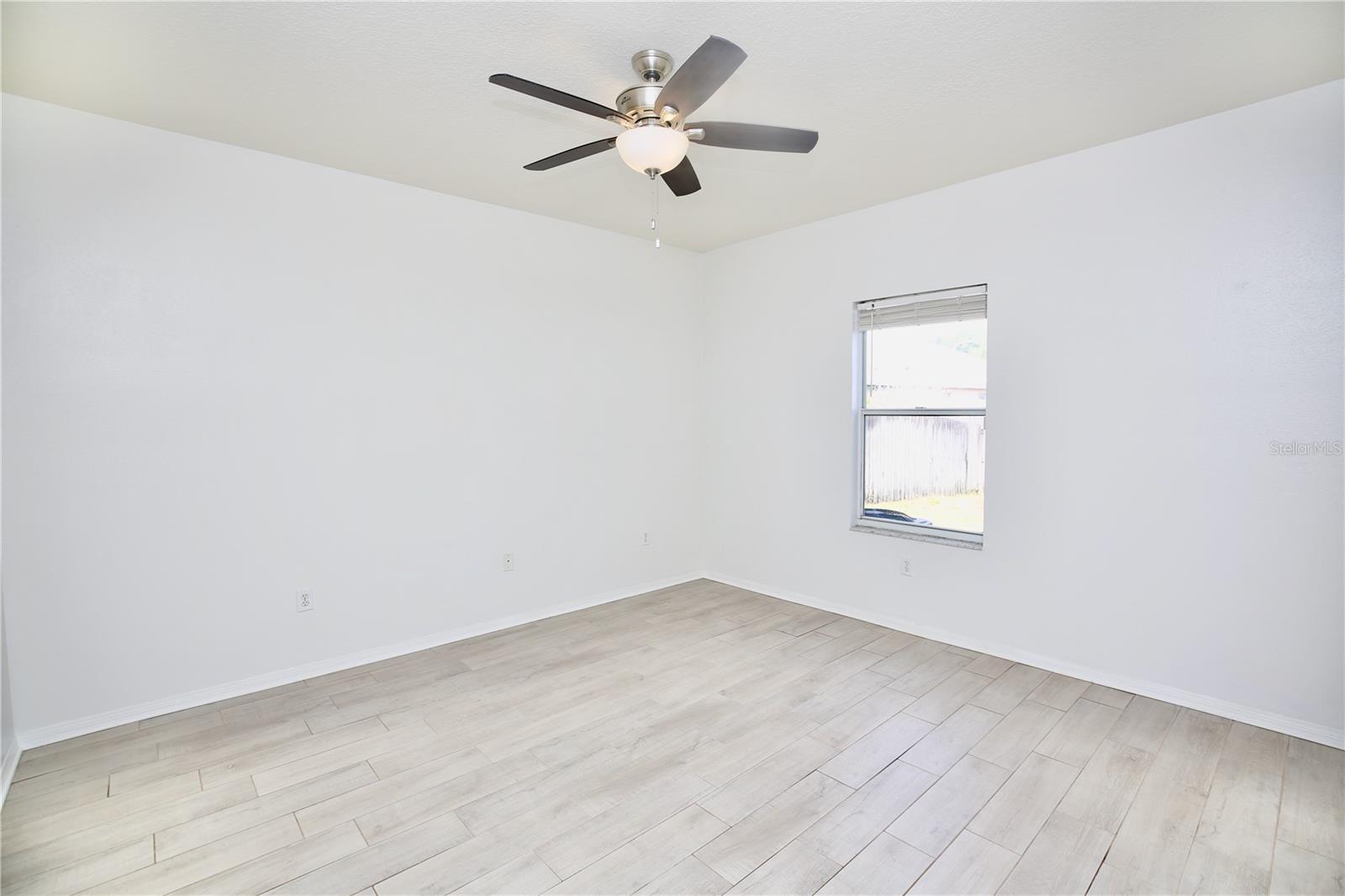 primary bedroom looking towards the backyard