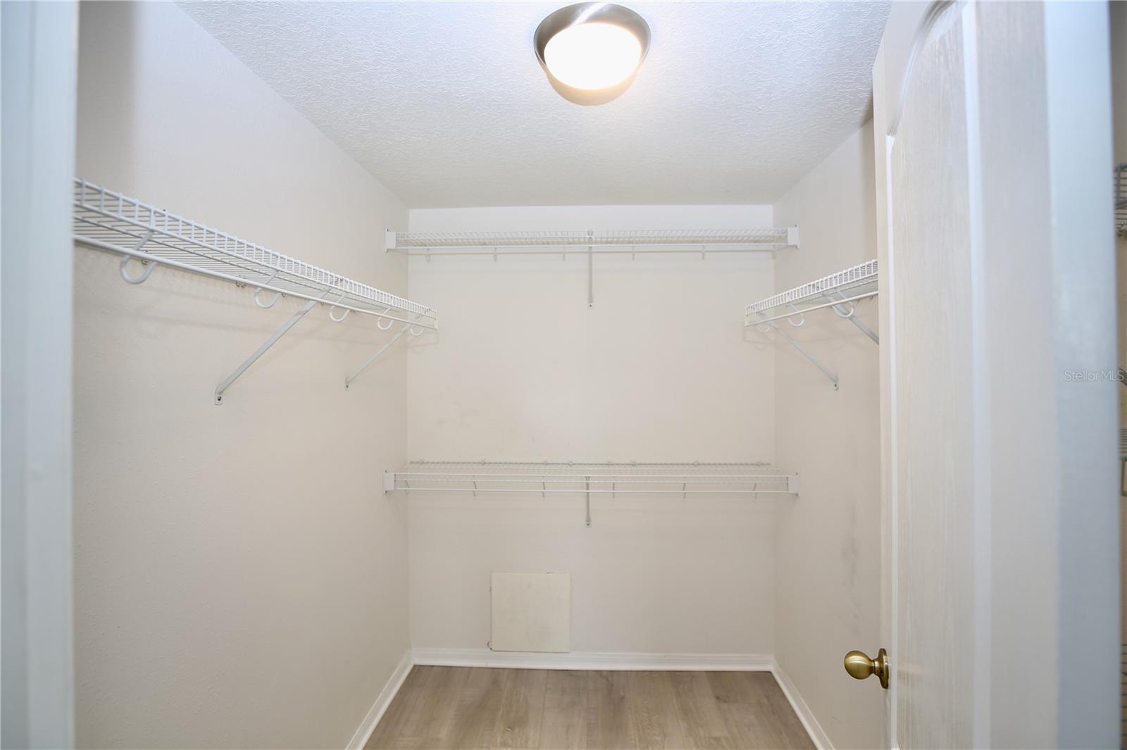 primary bedroom walk in closet
