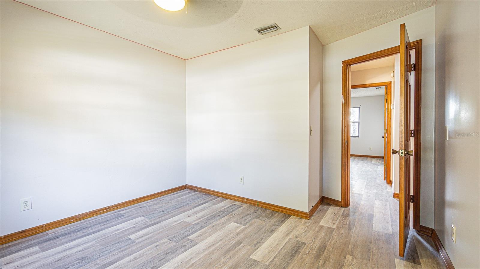 Bedroom 2 - looking down the hall to bedroom 3