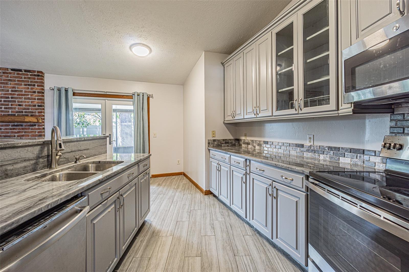 Gorgeous kitchen with tons of custom cabinetry features