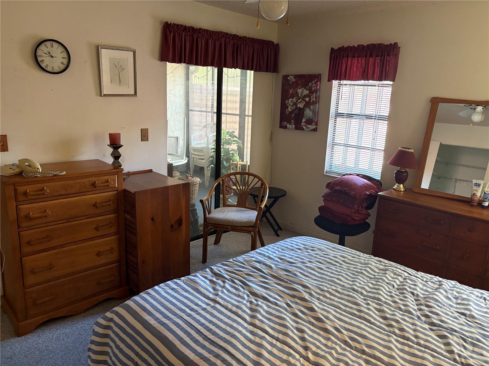 Bedroom with slider into lanai.