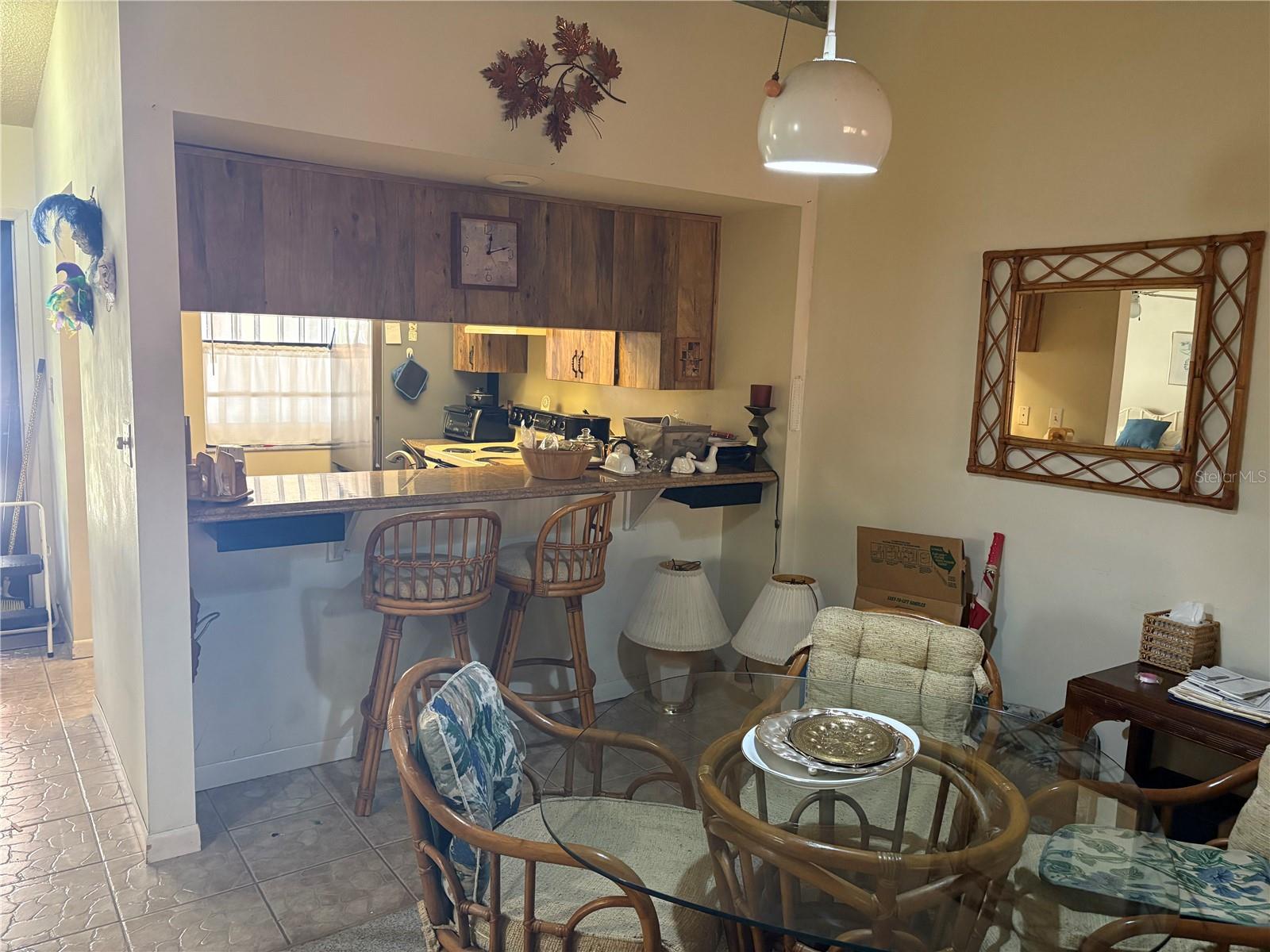 Dining area looking into kitchen.