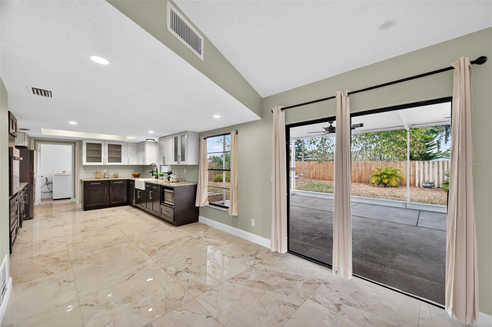 Large Sliding Doors leading to Screened porch