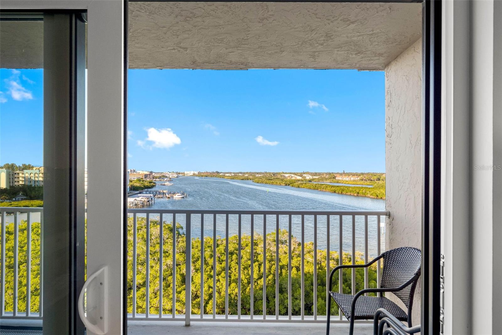 .. 7th Floor Affords Long Range Water Views For Miles.. New Sliders Work Great - They Slide Open & Close Beautifully. Living Room Looking Out..