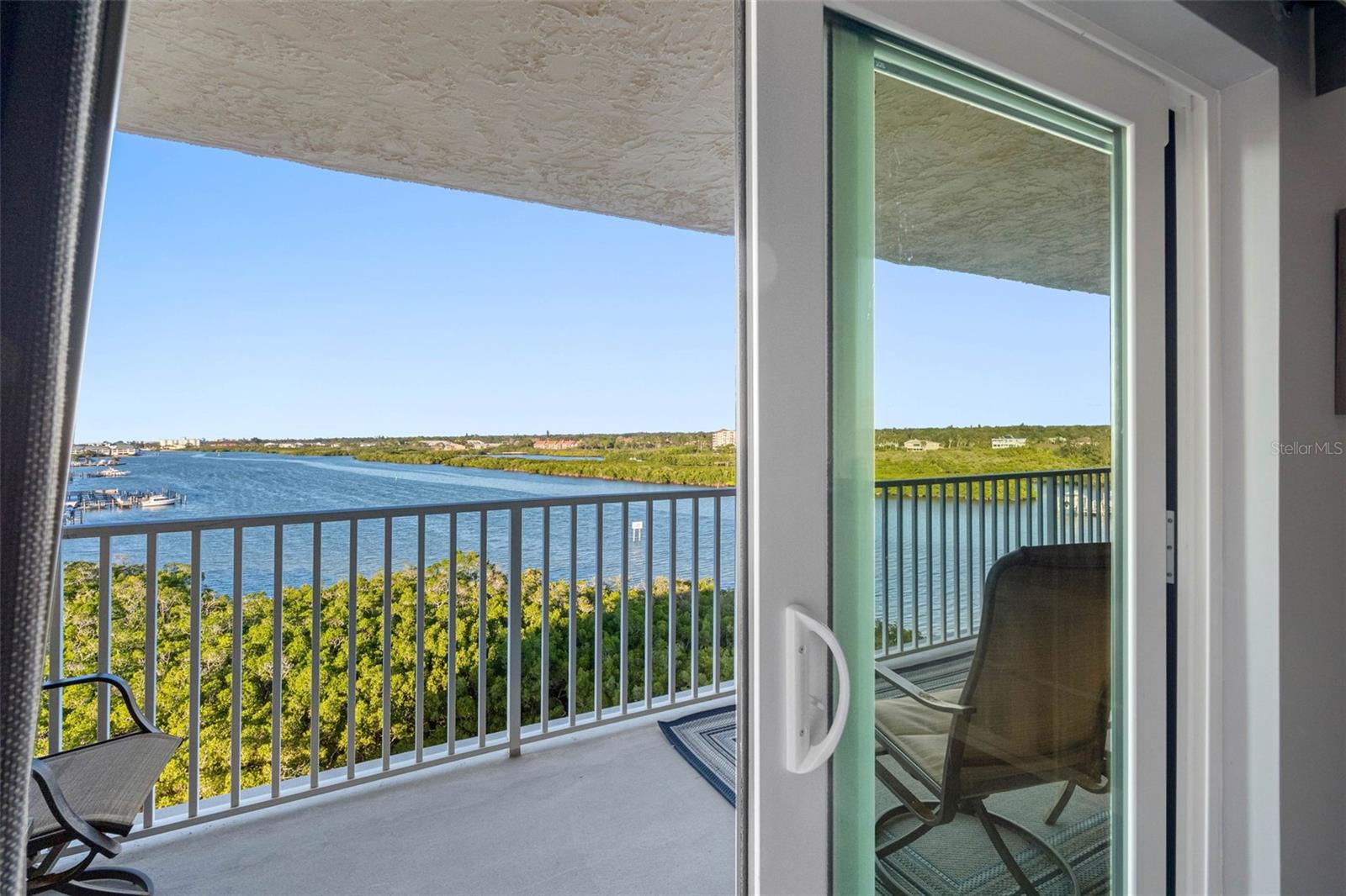 ..Water Views From Master Bedroom.. New Sliders - New Window Treatments. 25 Foot Long Balcony.