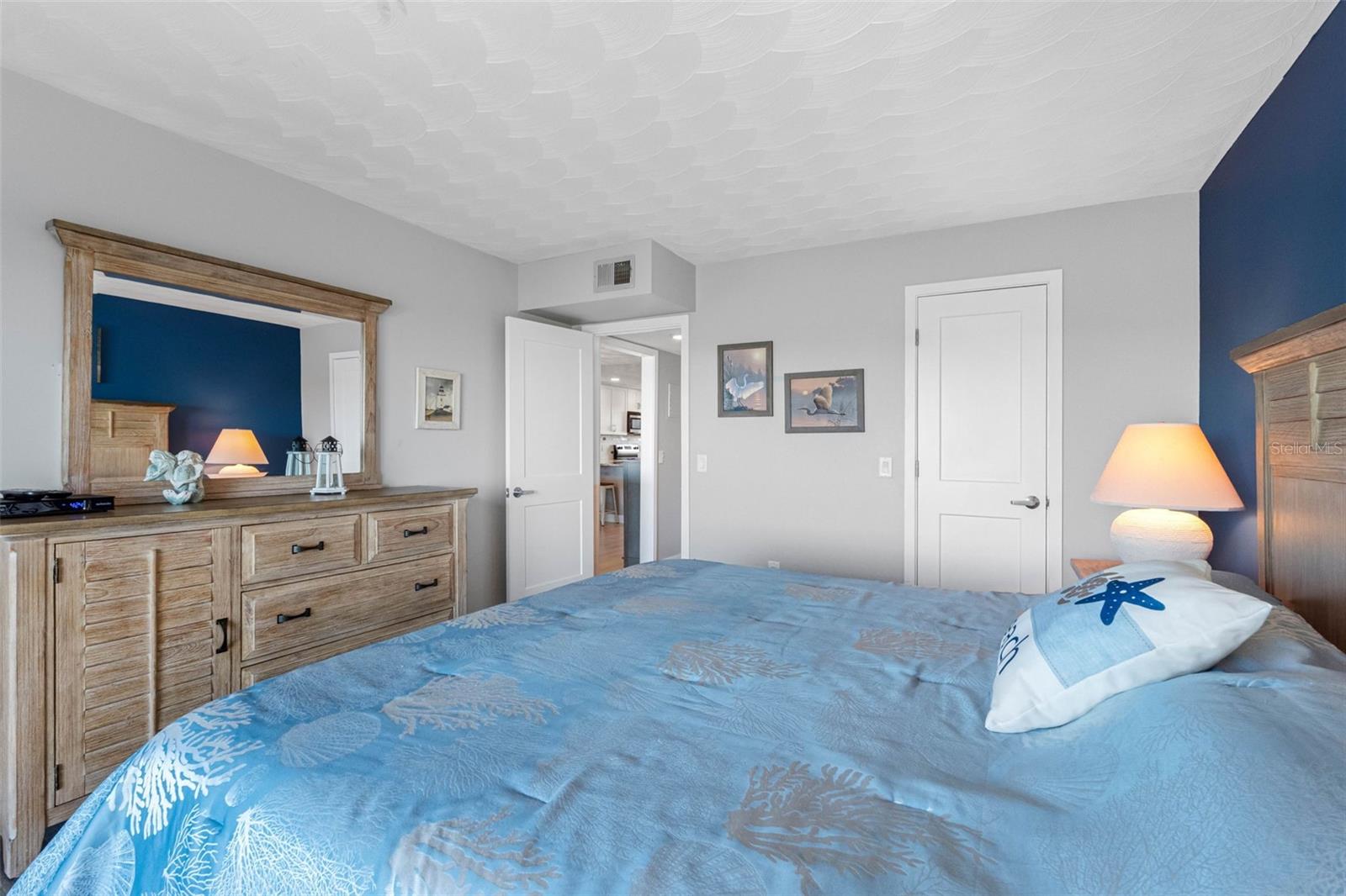 ... Master Bedroom Shot # 4..Looking In From Balcony.. Master Bathroom is Right outside Open Door. Walk In Closet - New 2 Panel White Door.