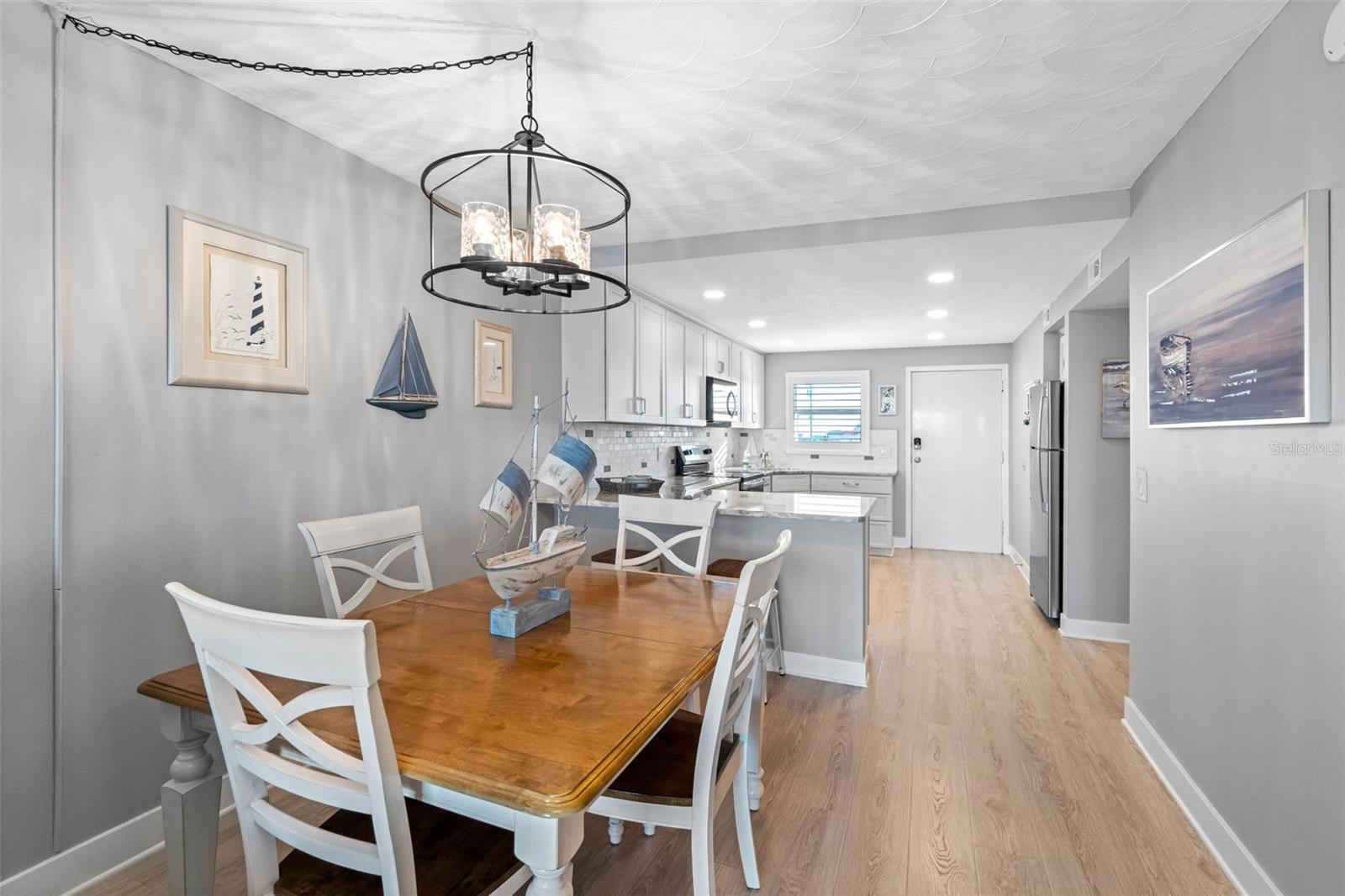 .. Interior Shot - Dining Area Towards Opened Remodeled Kitchen..