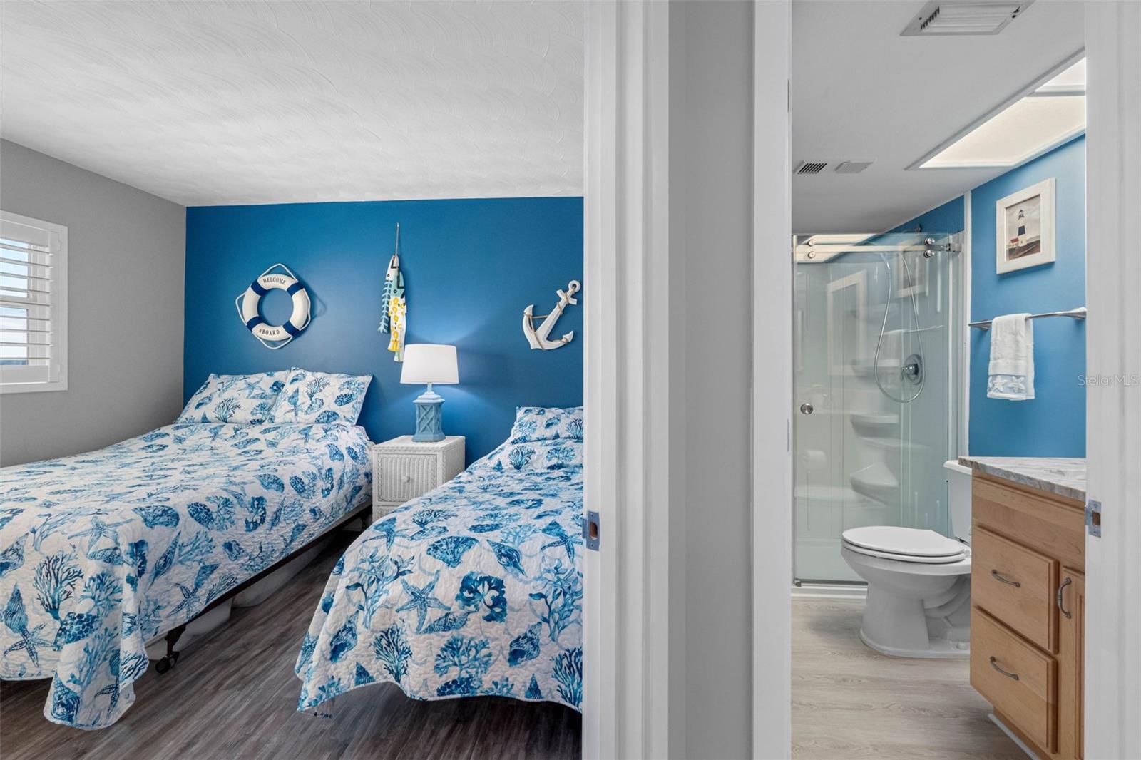 ...Guest Bedroom # 4.. New Remodeled Bathroom Next to Guest Bedroom. This 2nd Bath Also Services Common Area.  Remodeled With Walk In Shower..