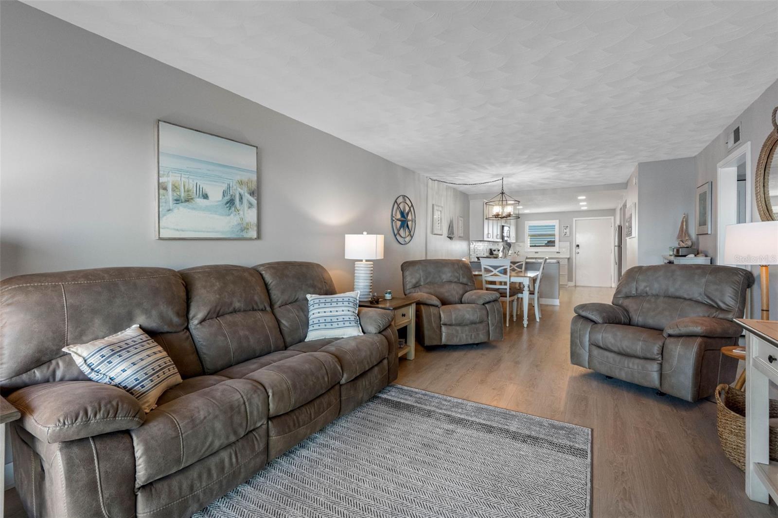 ... Looking In From Balcony.. Nicely Remodeled Unit. New Opened Kitchen - New Floors - New Sliders -New Glass - New Bathrooms - New Interior Doors.