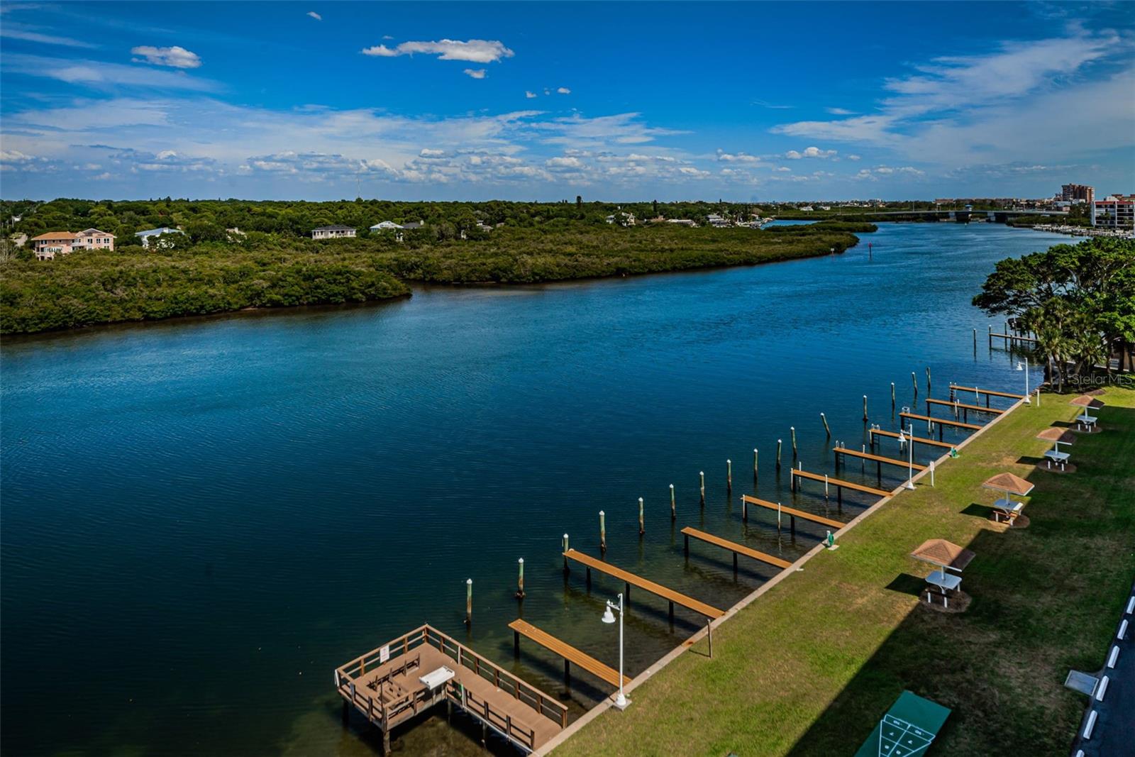 ... Nice Aerial View at Sunrise of Boat Slips and Covered Picnic Spots.. Fishing Dock on Left in Photo.