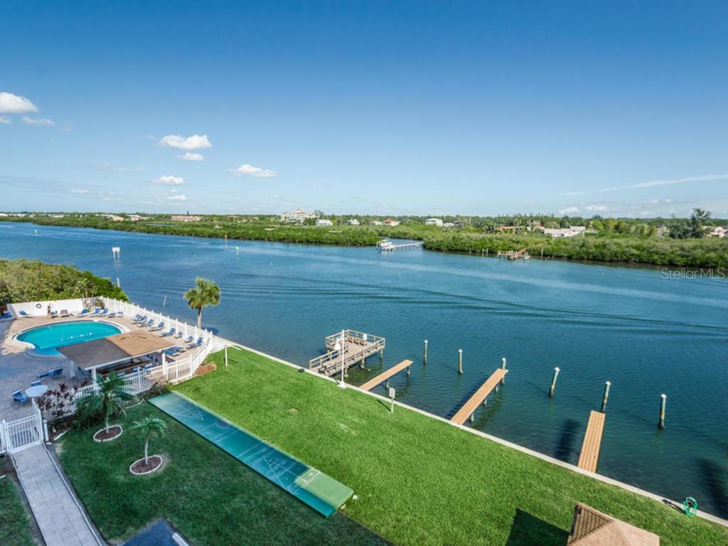 ...Waterfront Looking Right. Boat Slips Open To All Plus Shuffle Board &  Picnic Areas..
