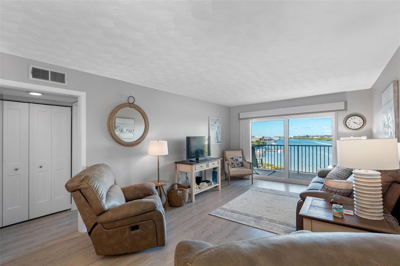 ... Shot of Living Area Towards Balcony.. NOTE: New Interior Doors on Left in Photo.