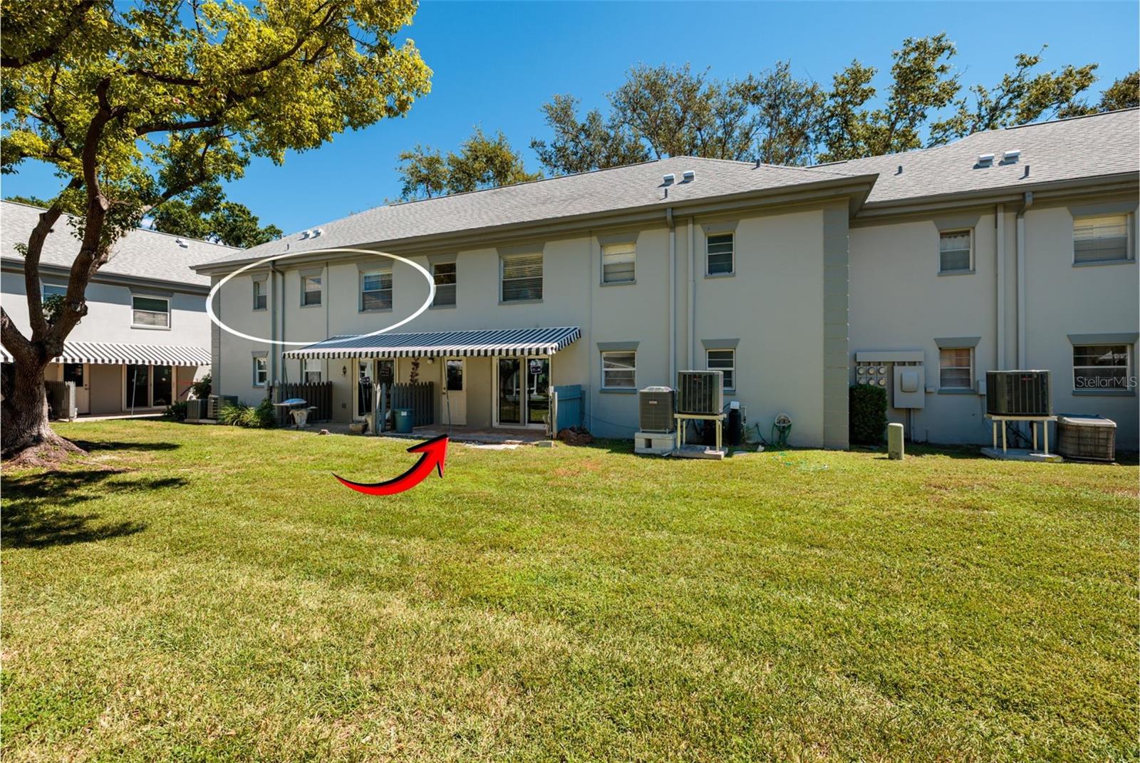 Bldg downstairs stairway door to unit from the courtyard.