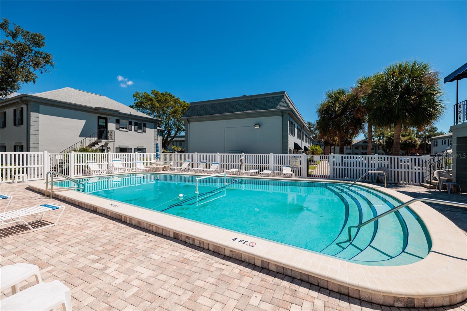 Heated pool next to clubhouse. 1 bldg away from unit.