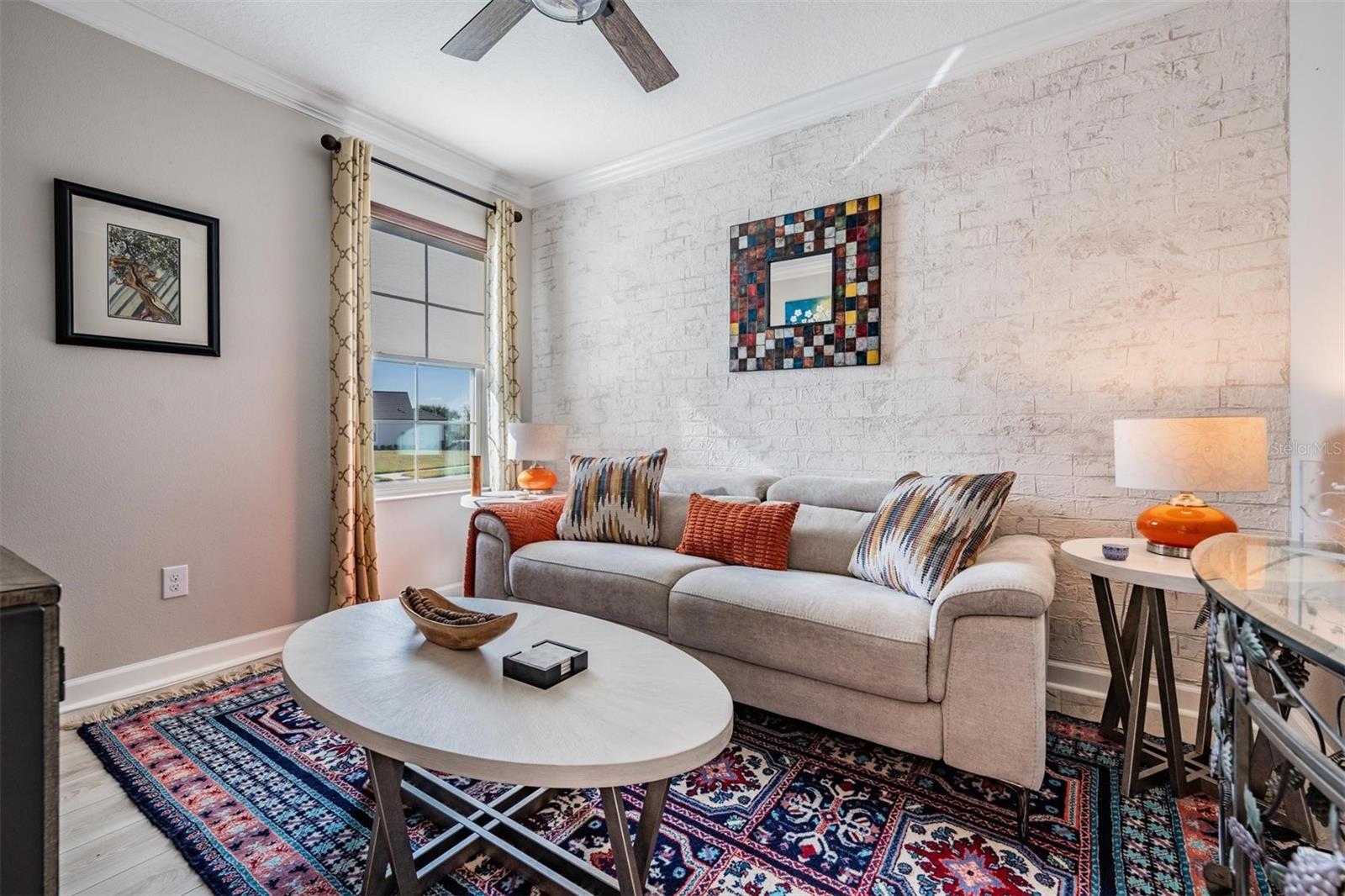 office/den/extra living space w/designer wall and crown molding