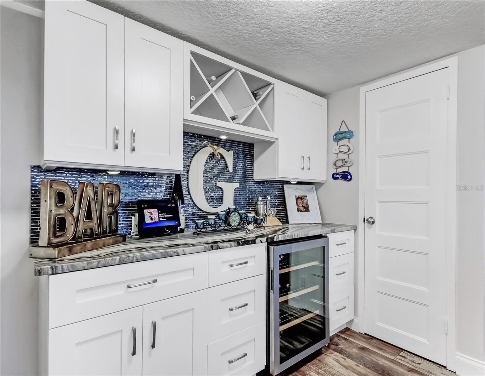 Dry bar and walk-in pantry.