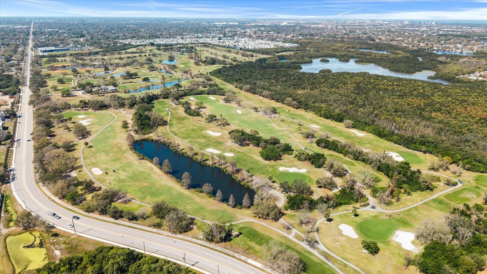Mangrove Bay & Cypress Links Golf Course a Golf Cart Ride Away