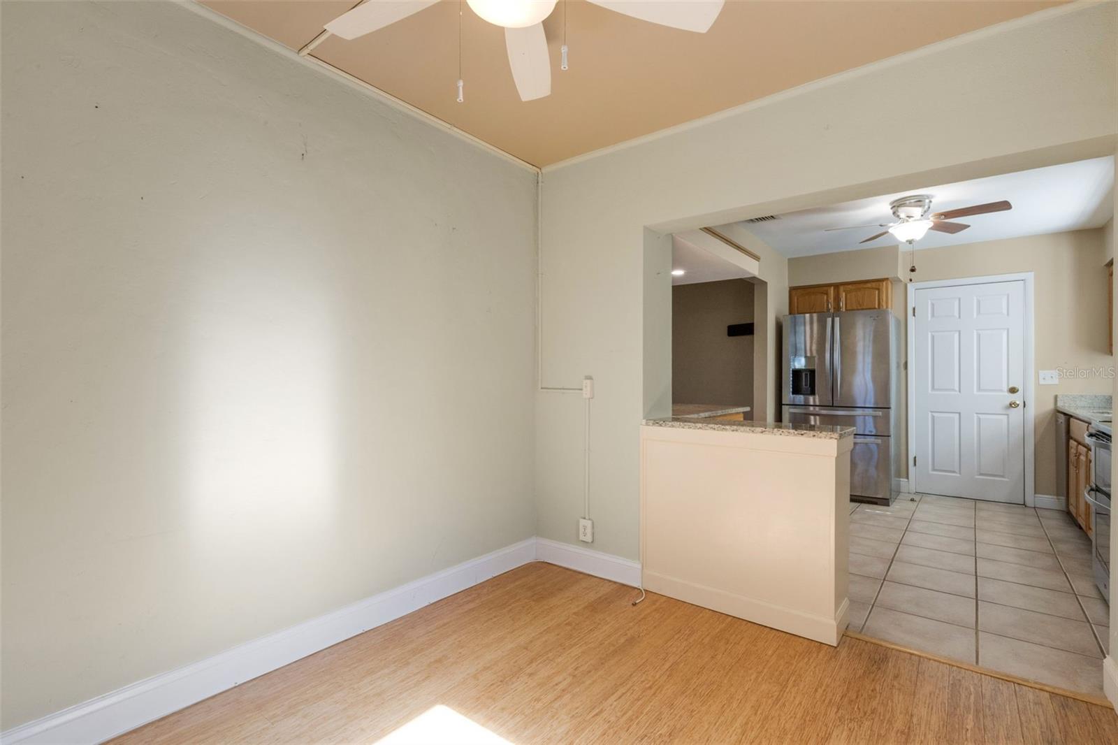 Ceiling fans in flex room and kitchen