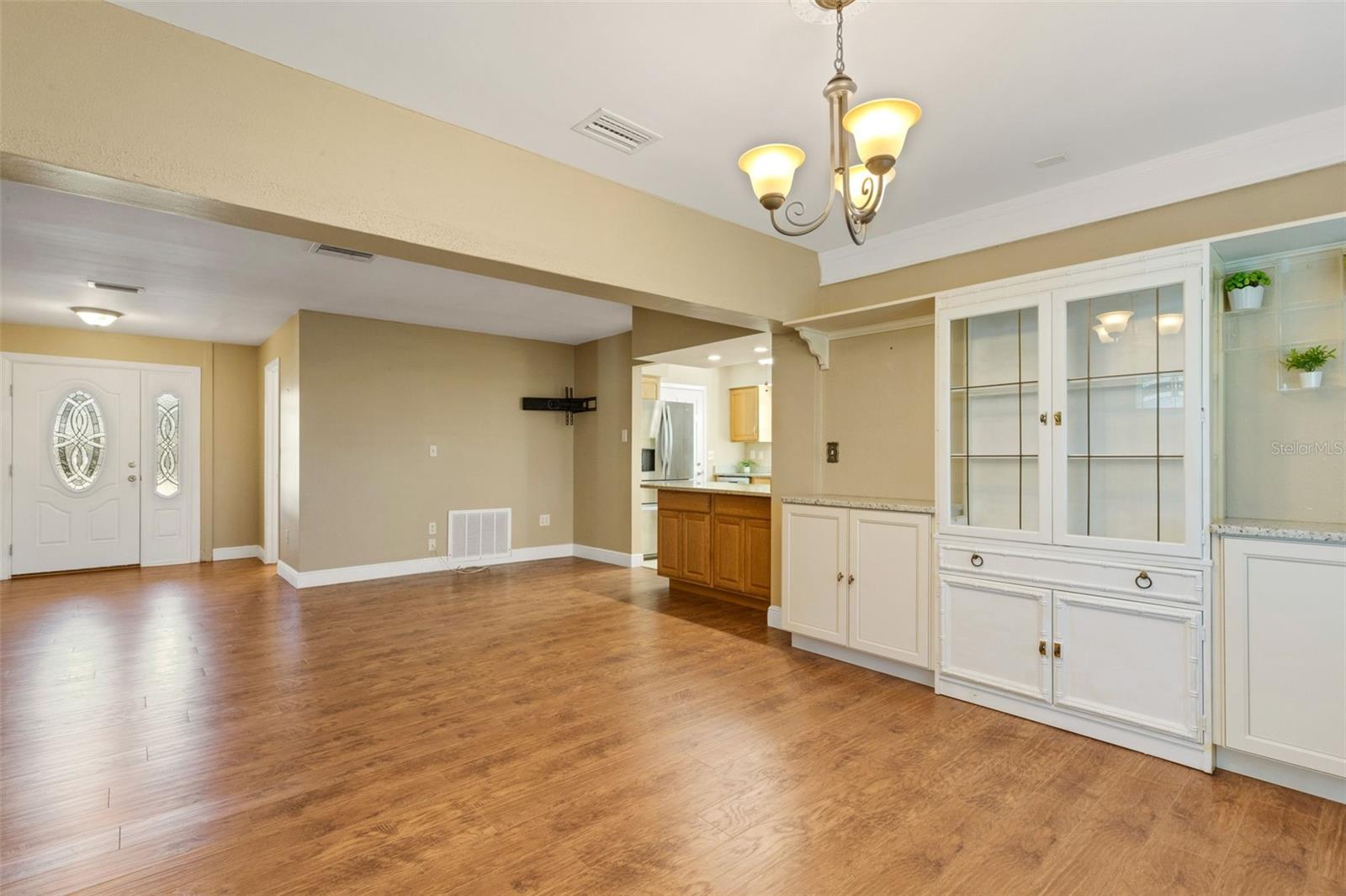built in bookcases and china cabinet in dining room