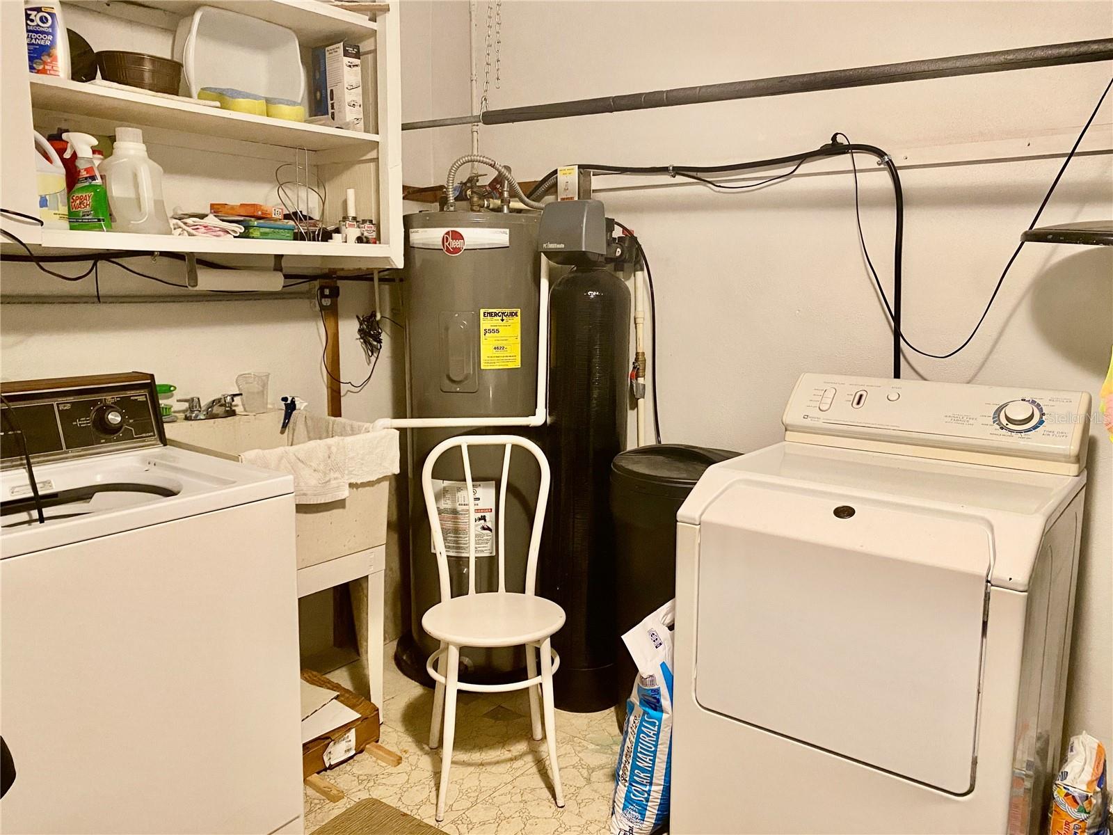 Washer, dryer and water softener in garage