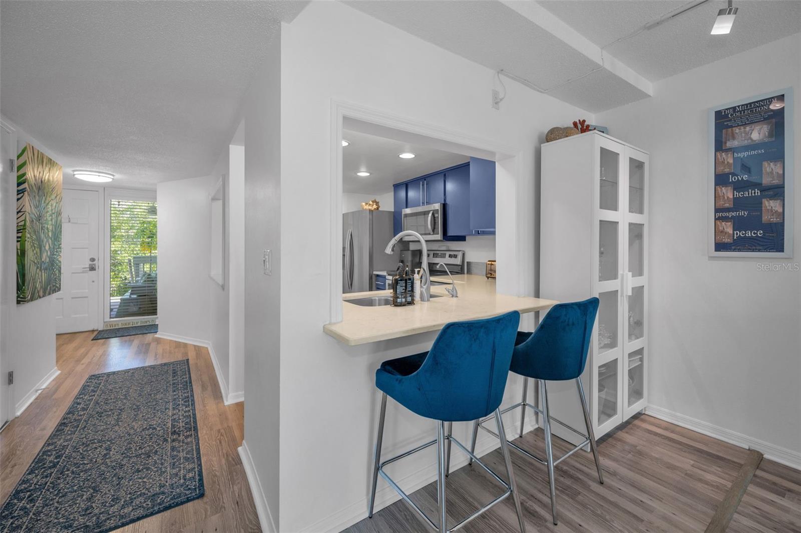Renovated Kitchen with Breakfast Bar and pass through