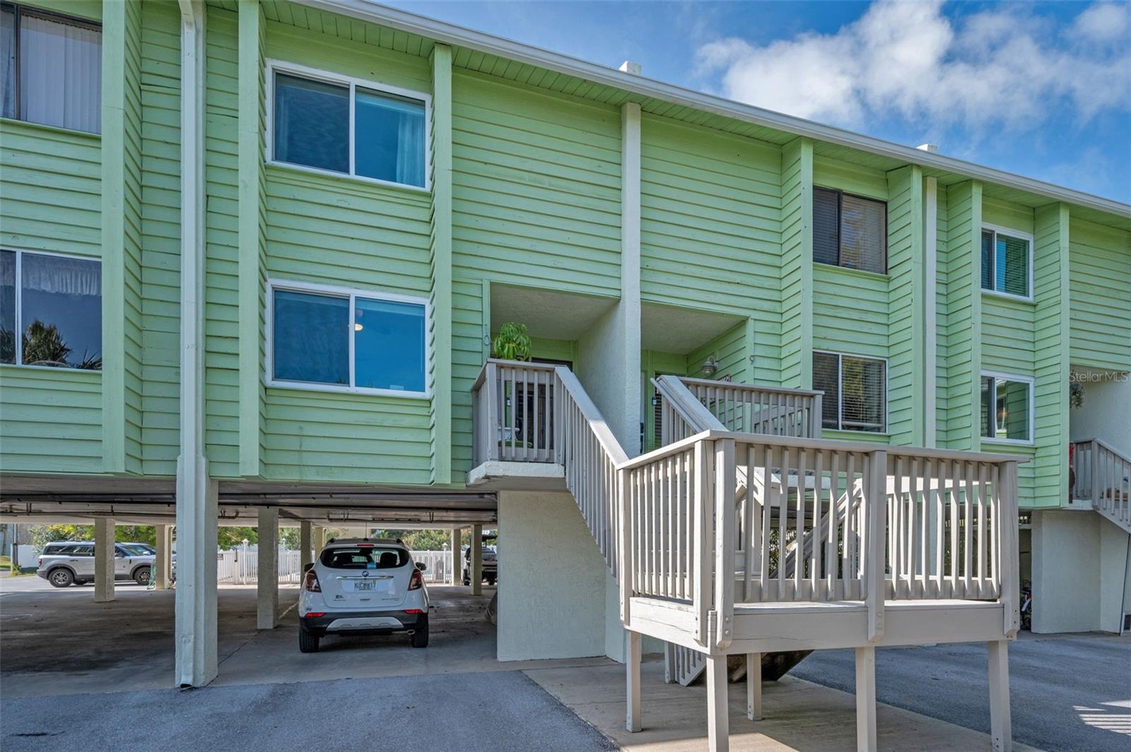 Indian Harbor Elevated Condo with 4 Designated Parking Spots!