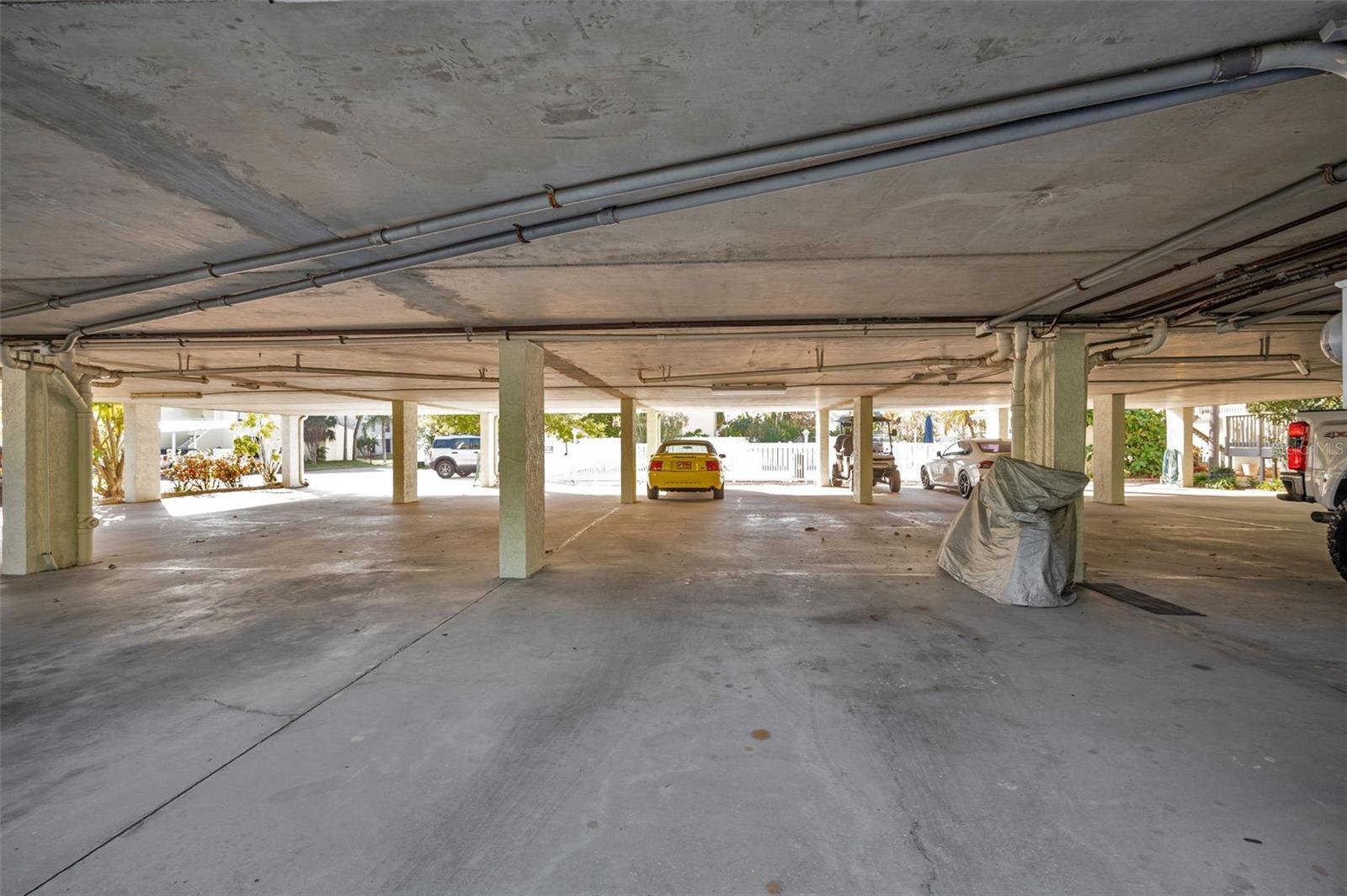 Designated 4 Car Under Building Parking Spaces for the Unit