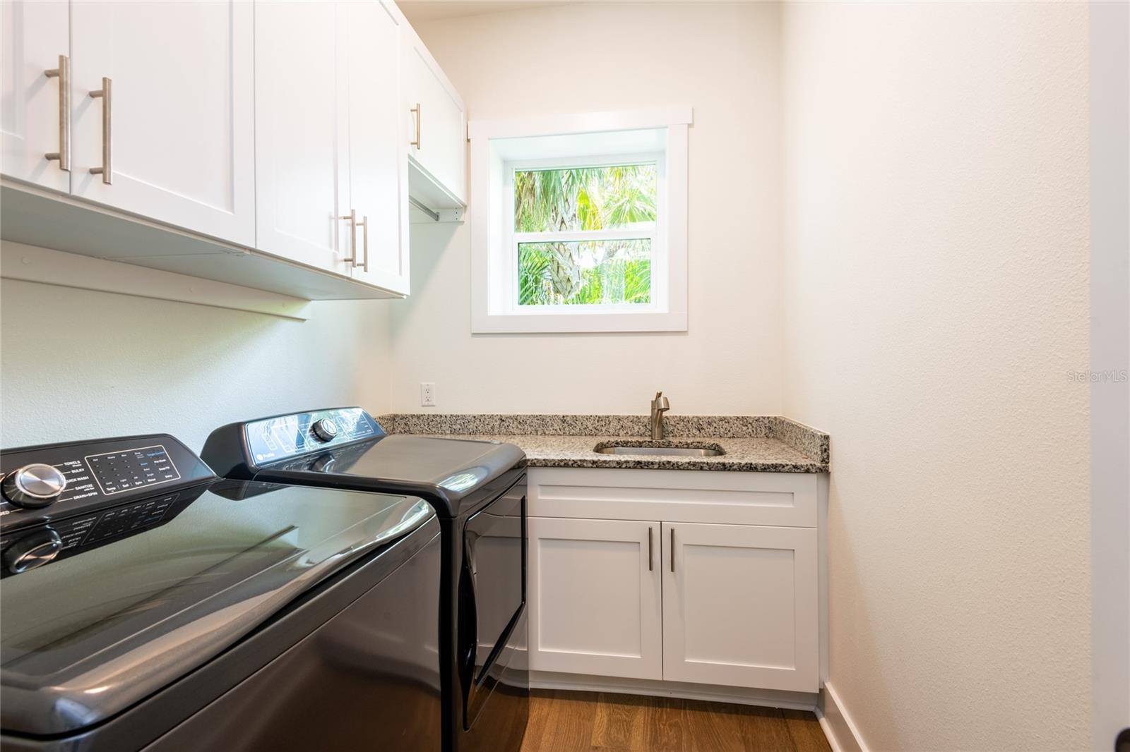 Laundry room w/ new washer and dryer
