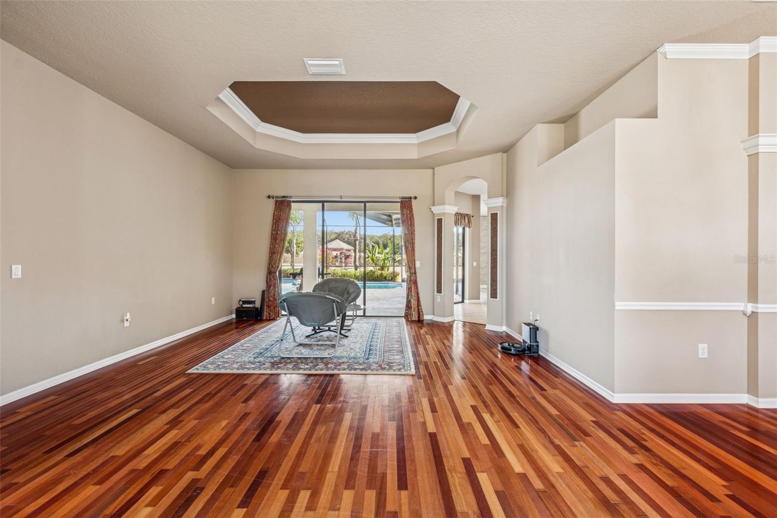 Formal Living Room - Harwood floors, coffered ceilings