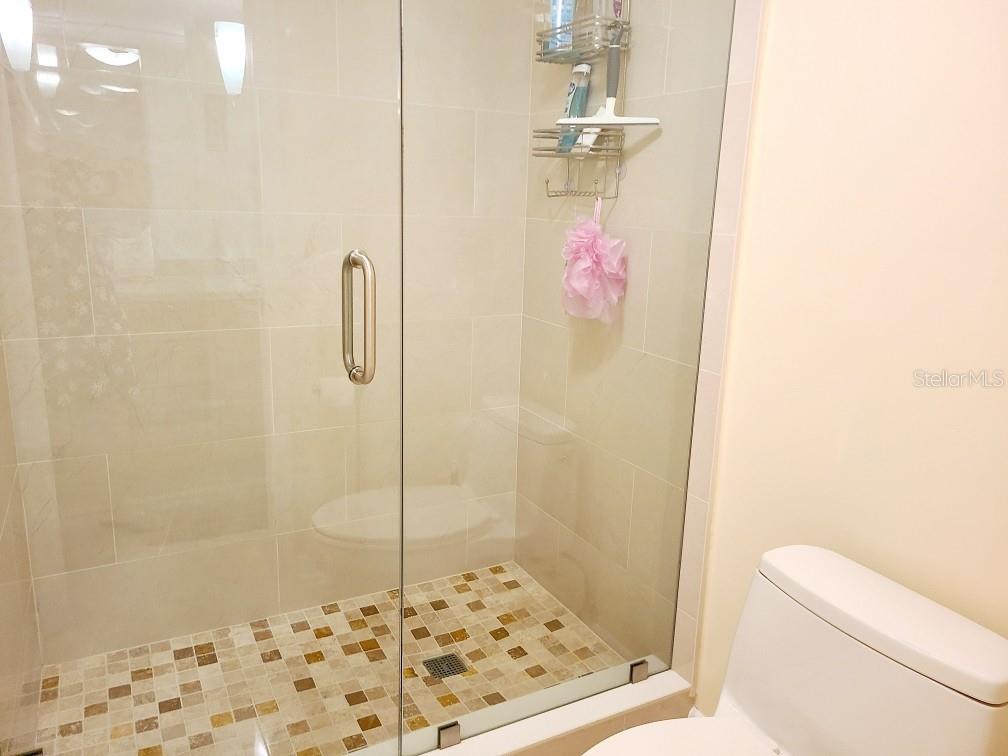Recently updated Master Shower with marble floors
