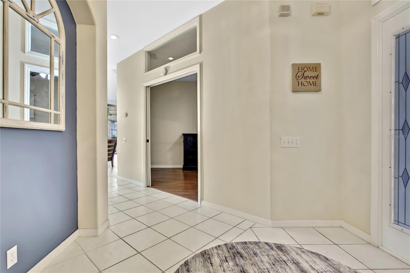 A spacious 10' x 10' foyer provides ample room to greet guests and serves as a convenient drop zone upon entering the home.