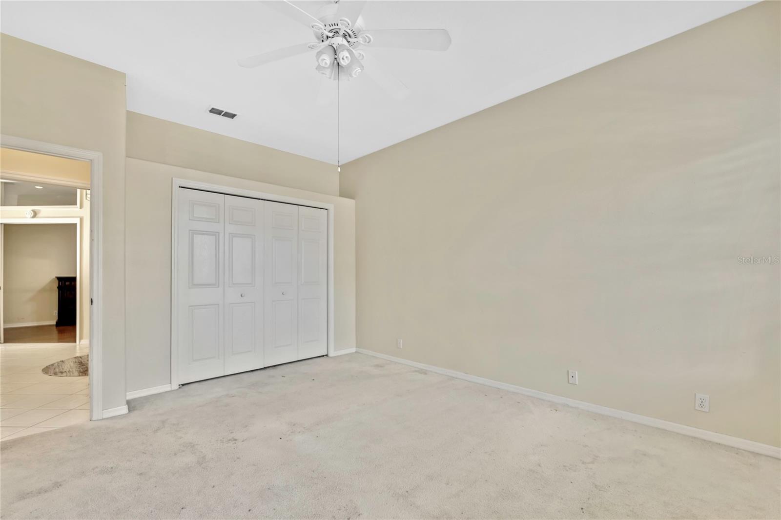 It features a large closet with ample room for storage.