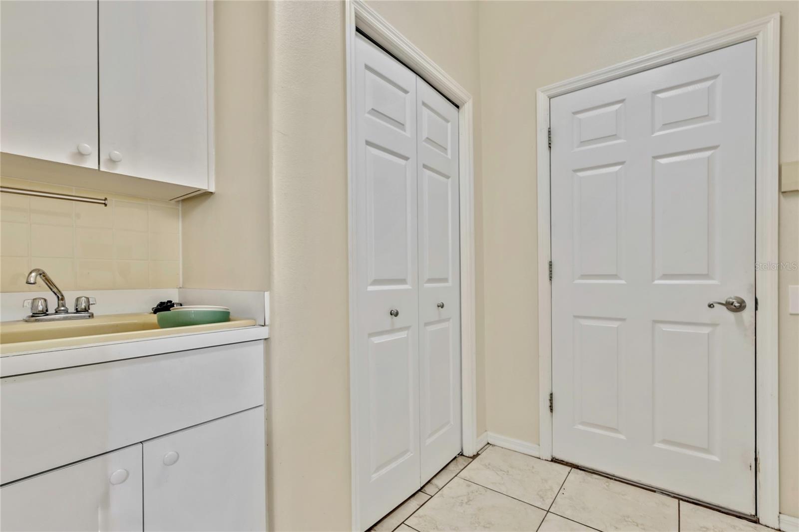 Laundry will be a breeze with lots of space, a utility sink and large closet for storage.