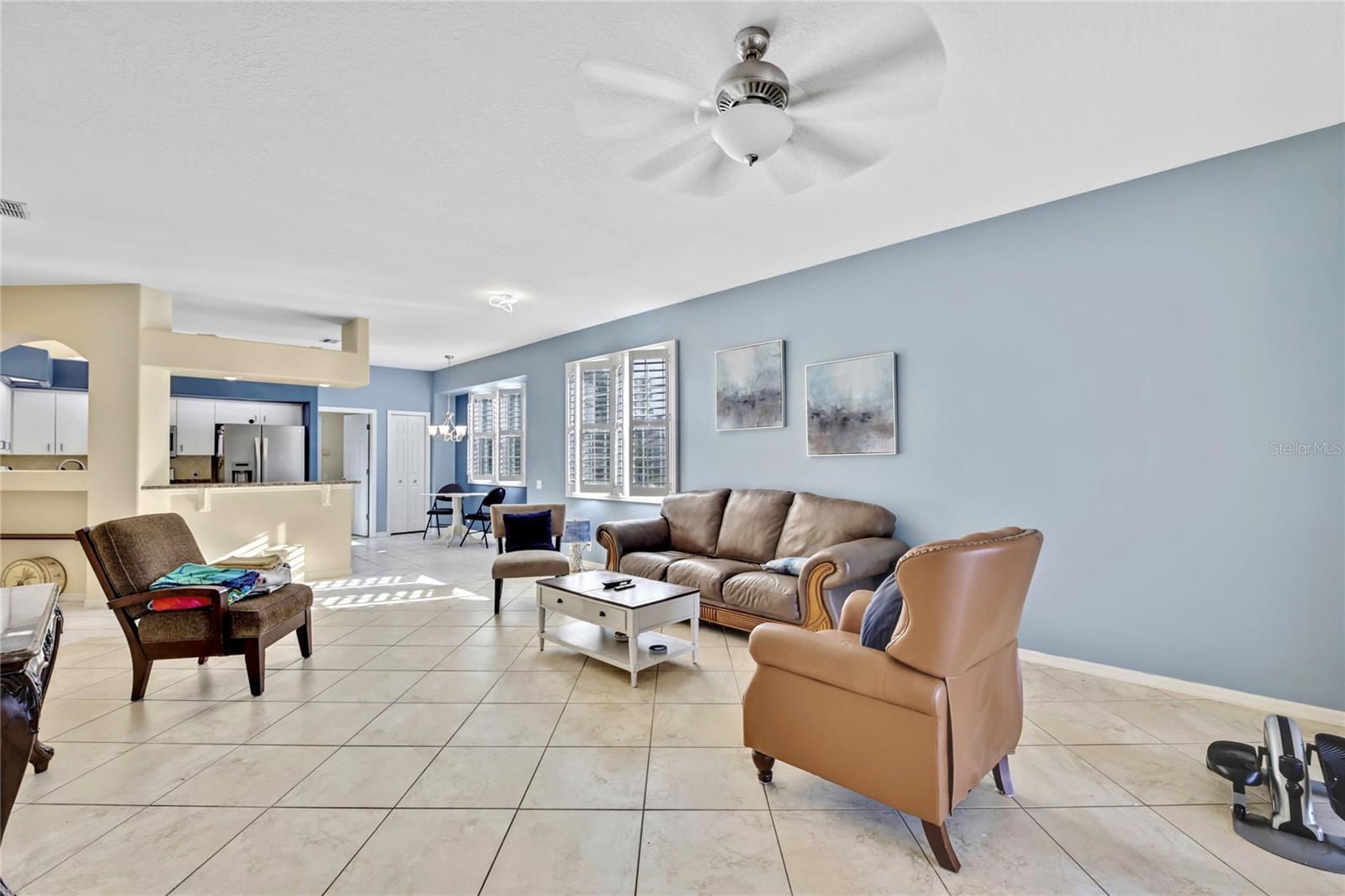 The open floor plan creates an inviting atmosphere that is perfect for entertaining guests or enjoying a relaxing evening at home.