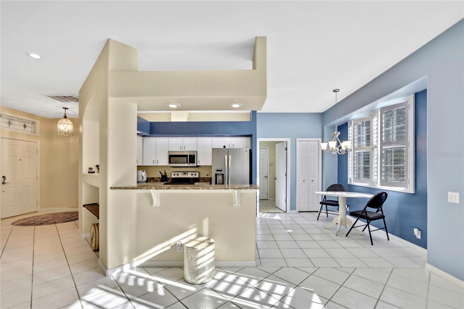 There is enough space for several barstools and a dining area, making it easy to host even large parties.