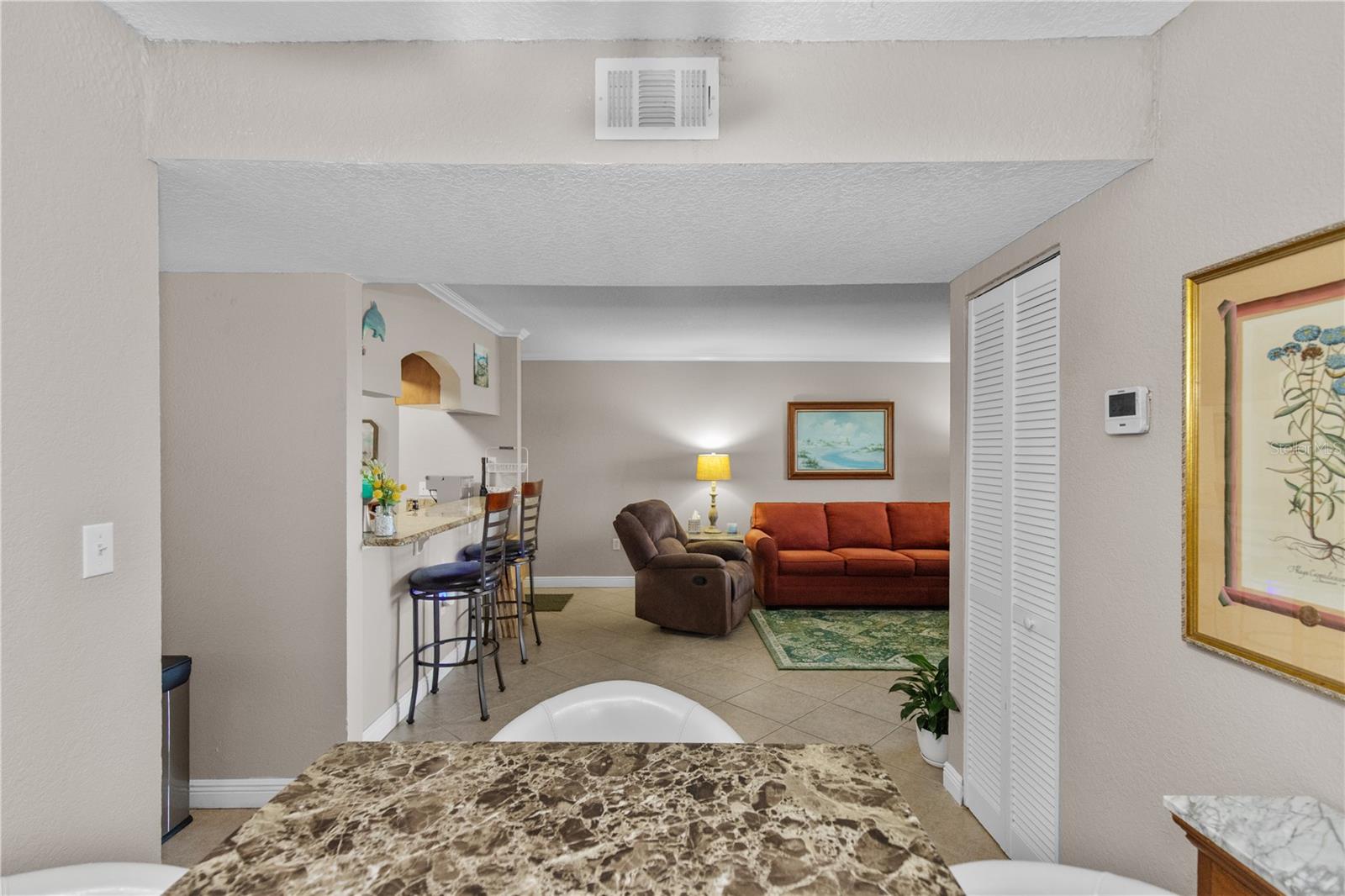 Dining room looking into the living room/kitchen