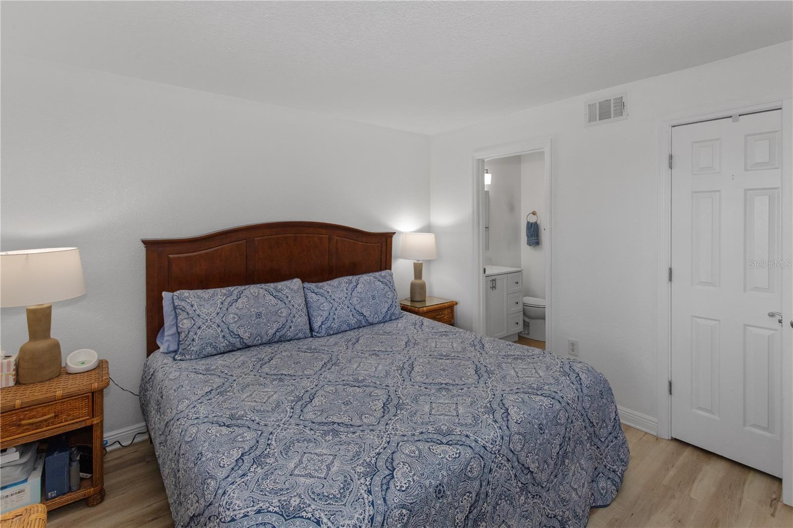 Primary bedroom has room for king size bed