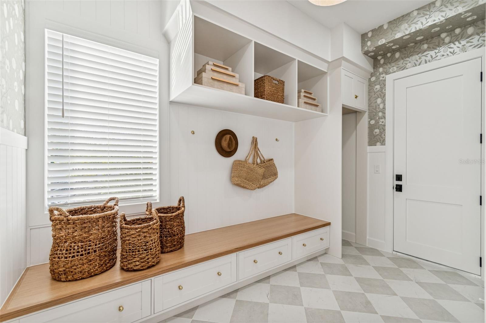 Mudroom with secondary laundry hook up