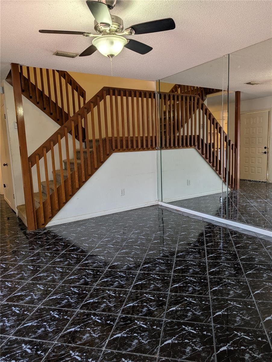 View of stairs from dining area