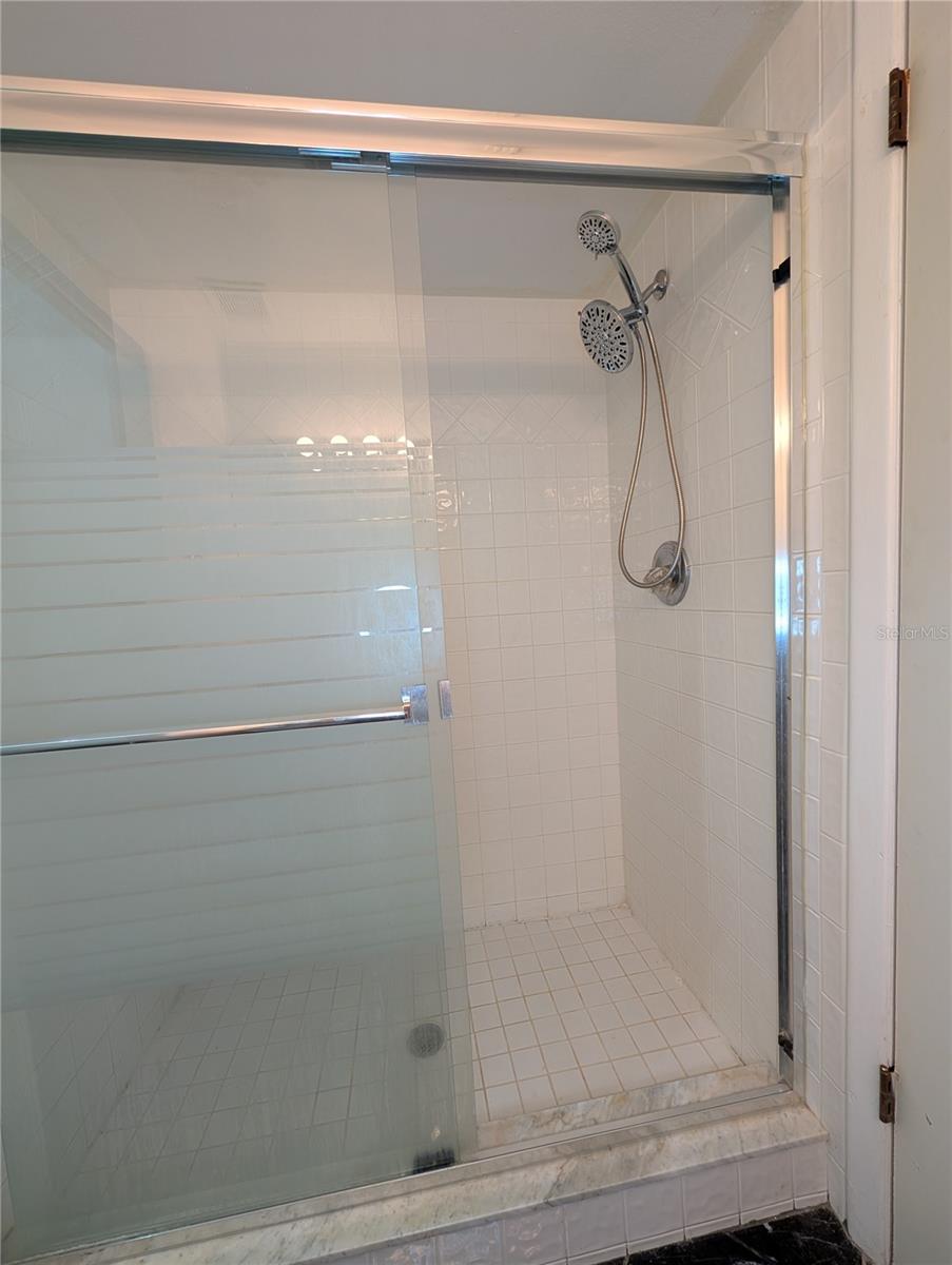 Glass shower to downstairs bathroom