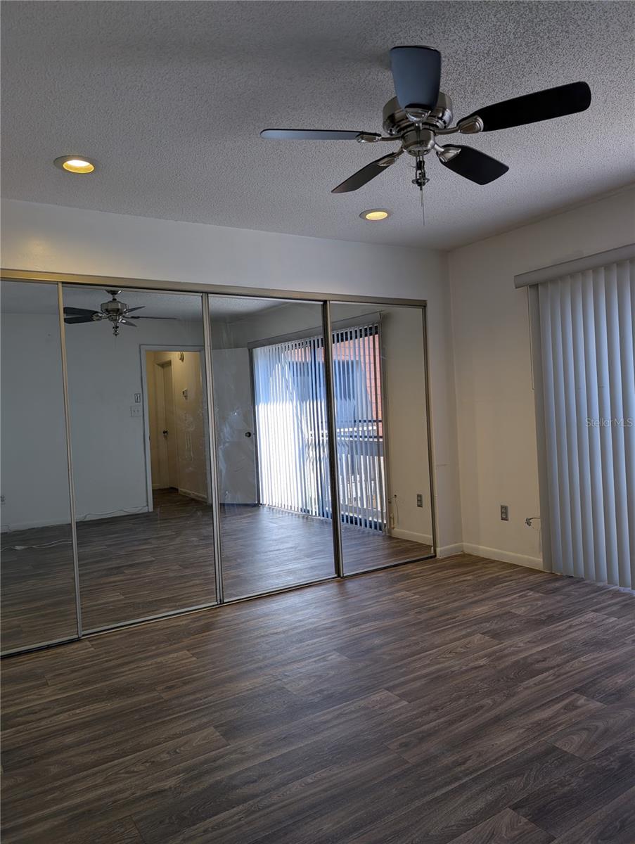Primary Bedroom with sliding miirored closet doors
