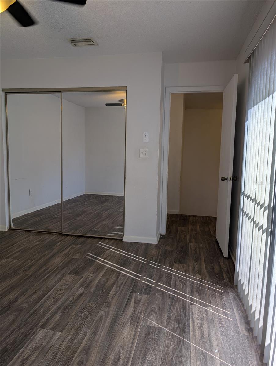 2nd Bedroom and mirror closet