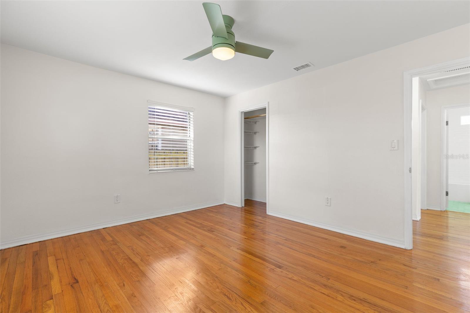 Bright primary bedroom with natural light