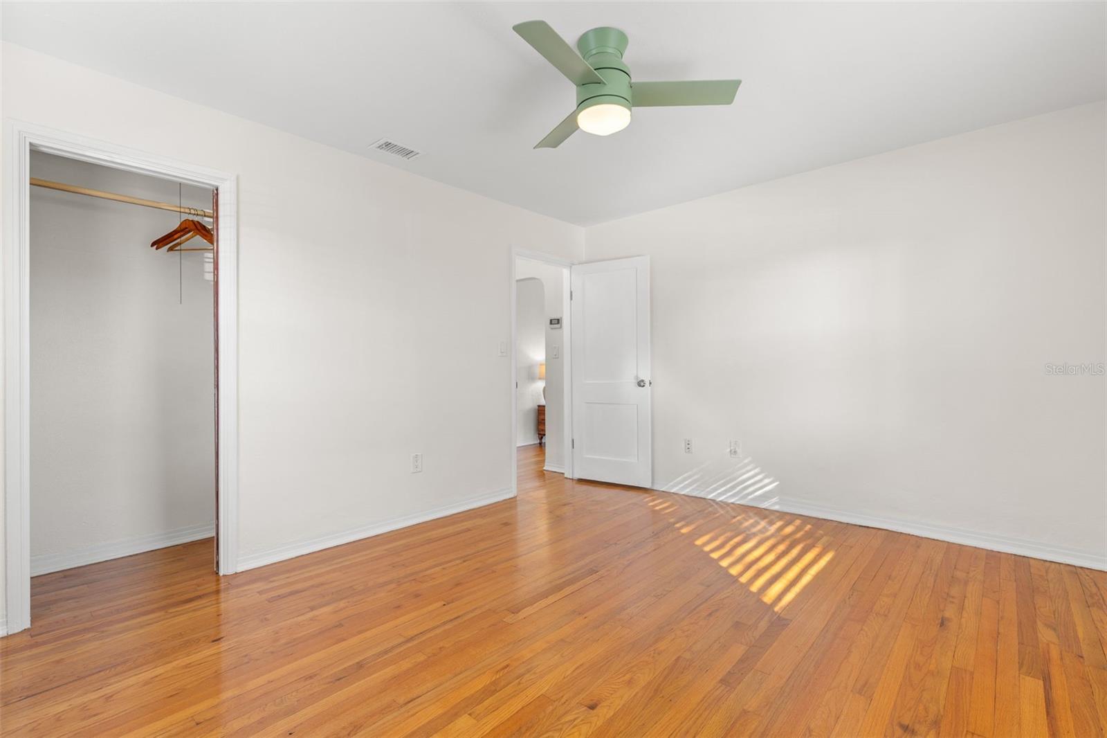 Comfortable primary room with classic charm