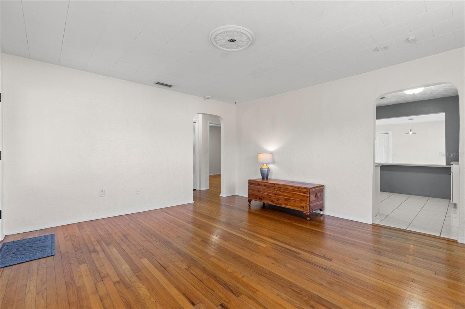 Bright living space with original hardwood floors